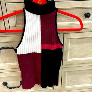 Sleeveless turtleneck sweater